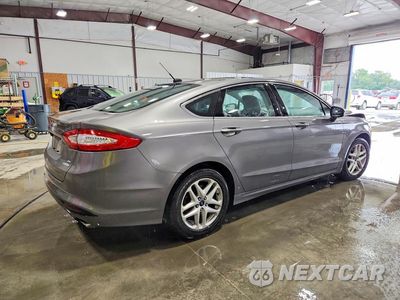 Trzecie zdjęcie samochodu z tyłu: 2014 FORD FUSION SE VIN:1FA6P0HD2E5360173 - miniatura
