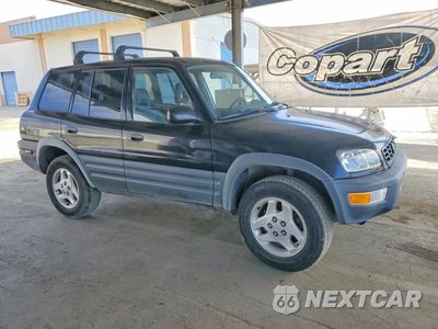 Czwarte zdjęcie samochodu z boku: 1999 TOYOTA RAV4 BASE VIN:JT3HP10V9W0170970 - miniatura