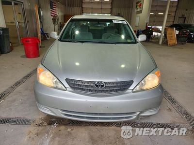 Piąte zdjęcie samochodu w środku: 2004 TOYOTA CAMRY LE VIN:4T1BE32K34U864142 - miniatura