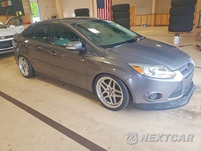 Czwarte zdjęcie samochodu z boku: 2012 FORD FOCUS SE VIN:1FAHP3F21CL341859 - miniatura