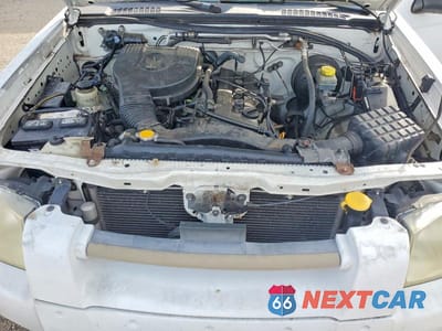 Zdjęcie 11 z 12 samochodu: 2004 NISSAN FRONTIER STANDARD VIN:1N6DD26T44C427461 - miniatura