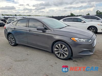 Czwarte zdjęcie samochodu z boku: 2019 FORD FUSION SE VIN:3FA6P0T97KR239778 - miniatura