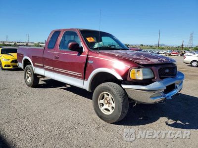 Czwarte zdjęcie samochodu z boku: 1997 FORD F150 VIN:1FTDX1866VKA58380 - miniatura