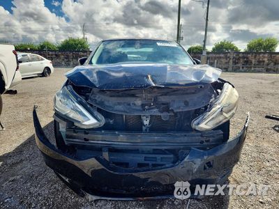 Piąte zdjęcie samochodu w środku: 2018 NISSAN SENTRA S VIN:3N1AB7AP8JY219477 - miniatura