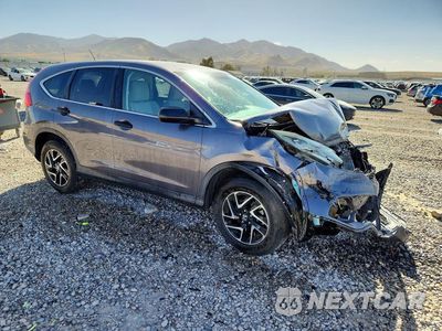 Czwarte zdjęcie samochodu z boku: 2016 HONDA CR-V SE VIN:5J6RM4H4XGL042575 - miniatura