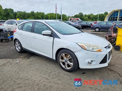 Czwarte zdjęcie samochodu z boku: 2012 FORD FOCUS SE VIN:1FAHP3K29CL296868 - miniatura
