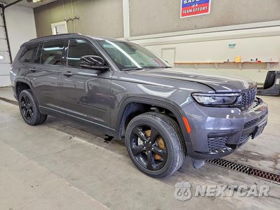 Czwarte zdjęcie samochodu z boku: 2023 JEEP GRAND CHEROKEE L LAREDO VIN:1C4RJKAG9P8831200 - miniatura