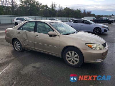 Czwarte zdjęcie samochodu z boku: 2003 TOYOTA CAMRY XLE V6 VIN:4T1BF30K33U655037 - miniatura
