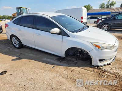 Czwarte zdjęcie samochodu z boku: 2016 FORD FOCUS SE VIN:1FADP3F22GL222559 - miniatura
