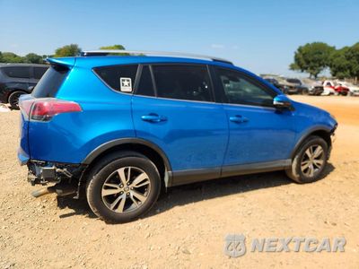 Trzecie zdjęcie samochodu z tyłu: 2018 TOYOTA RAV4 XLE VIN:JTMWFREV3JJ738971 - miniatura