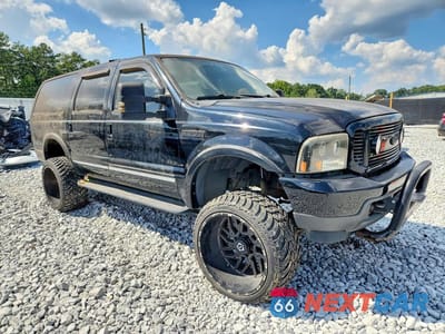 Czwarte zdjęcie samochodu z boku: 2003 FORD EXCURSION LIMITED VIN:1FMNU43S63ED40674 - miniatura