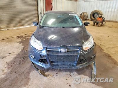 Piąte zdjęcie samochodu w środku: 2014 FORD FOCUS TITANIUM VIN:1FADP3N22EL258900 - miniatura