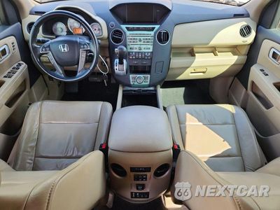 Zdjęcie 8 z 13 samochodu: 2011 HONDA PILOT TOURING VIN:5FNYF3H9XBB043058 - miniatura