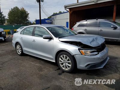 Czwarte zdjęcie samochodu z boku: 2014 VOLKSWAGEN JETTA SE VIN:3VWD17AJ0EM400303 - miniatura