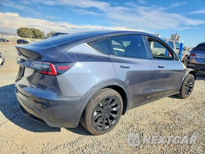 Trzecie zdjęcie samochodu z tyłu: 2022 TESLA MODEL Y VIN:7SAYGAEE8NF420335 - miniatura