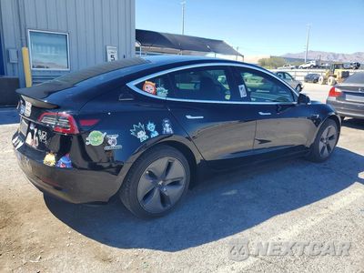 Trzecie zdjęcie samochodu z tyłu: 2019 TESLA MODEL 3 VIN:5YJ3E1EA6KF466719 - miniatura