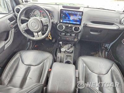Zdjęcie 8 z 12 samochodu: 2015 JEEP WRANGLER UNLIMITED SAHARA VIN:1C4BJWEGXFL561781 - miniatura