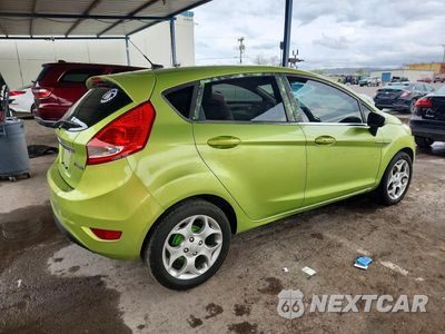 Trzecie zdjęcie samochodu z tyłu: 2011 FORD FIESTA SES VIN:3FADP4FJ8BM142848 - miniatura