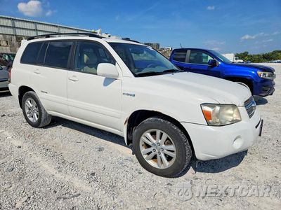 Czwarte zdjęcie samochodu z boku: 2006 TOYOTA HIGHLANDER HYBRID VIN:JTEEW21AX60025550 - miniatura