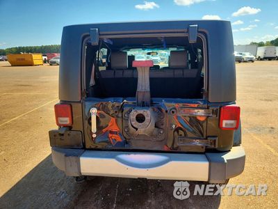 Zdjęcie 6 z 13 samochodu: 2009 JEEP WRANGLER UNLIMITED SAHARA VIN:1J4GA59159L772763 - miniatura