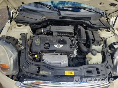 Zdjęcie 11 z 12 samochodu: 2013 MINI COOPER VIN:WMWSU3C52DT678384 - miniatura