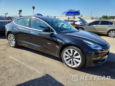Czwarte zdjęcie samochodu z boku: 2018 TESLA MODEL 3 VIN:5YJ3E1EA0JF071031 - miniatura