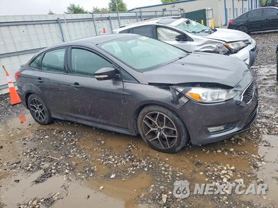Czwarte zdjęcie samochodu z boku: 2015 FORD FOCUS SE VIN:1FADP3F20FL217004 - miniatura