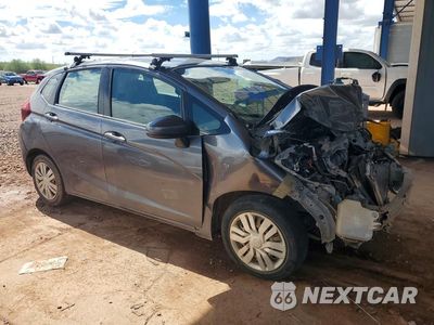 Czwarte zdjęcie samochodu z boku: 2017 HONDA FIT LX VIN:3HGGK5G58HM711897 - miniatura
