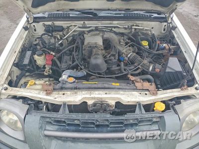 Zdjęcie 12 z 13 samochodu: 2002 NISSAN XTERRA XE S VIN:5N1MD28Y92C581748 - miniatura