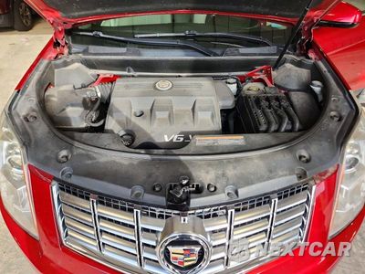 Zdjęcie 12 z 13 samochodu: 2013 CADILLAC SRX LUXURY COLLECTION VIN:3GYFNCE36DS549887 - miniatura