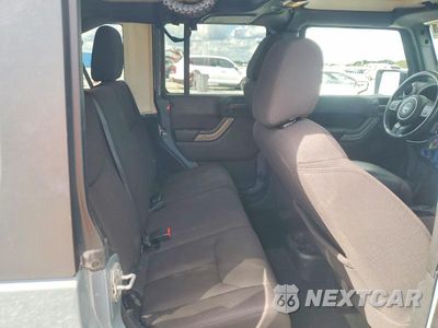 Zdjęcie 10 z 12 samochodu: 2015 JEEP WRANGLER UNLIMITED SPORT VIN:1C4BJWDG1FL619035 - miniatura