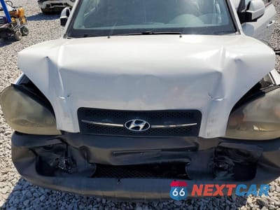 Zdjęcie 12 z 14 samochodu: 2005 HYUNDAI TUCSON GLS VIN:KM8JN72D05U085867 - miniatura
