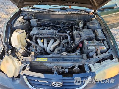 Zdjęcie 11 z 12 samochodu: 2001 TOYOTA COROLLA LE VIN:2T1BR12E21C499050 - miniatura