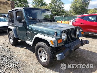 Czwarte zdjęcie samochodu z boku: 2003 JEEP WRANGLER COMMANDO VIN:1J4FA39S63P336688 - miniatura