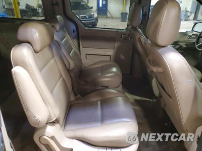 Zdjęcie 11 z 13 samochodu: 2004 FORD FREESTAR LIMITED VIN:2FMDA58294BA54902 - miniatura