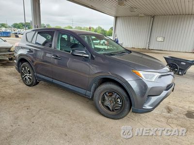 Czwarte zdjęcie samochodu z boku: 2018 TOYOTA RAV4 LE VIN:2T3BFREV5JW777092 - miniatura