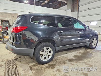 Trzecie zdjęcie samochodu z tyłu: 2010 CHEVROLET TRAVERSE LT VIN:1GNLVFED2AS124670 - miniatura