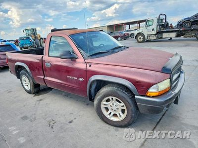 Czwarte zdjęcie samochodu z boku: 2002 DODGE DAKOTA BASE VIN:1B7FL16X82S719483 - miniatura