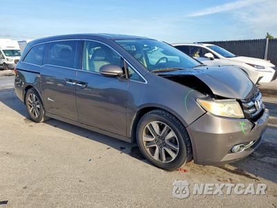 Czwarte zdjęcie samochodu z boku: 2014 HONDA ODYSSEY TOURING VIN:5FNRL5H90EB078155 - miniatura