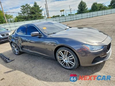 Czwarte zdjęcie samochodu z boku: 2016 MASERATI GHIBLI S VIN:ZAM57RSA2G1175555 - miniatura