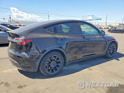 Trzecie zdjęcie samochodu z tyłu: 2021 TESLA MODEL Y VIN:5YJYGAEE4MF159751 - miniatura