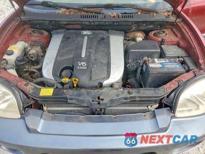 Zdjęcie 12 z 13 samochodu: 2004 HYUNDAI SANTA FE GLS VIN:KM8SC13E04U745306 - miniatura