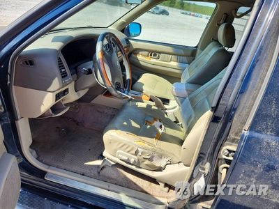 Zdjęcie 7 z 13 samochodu: 2002 INFINITI QX4 BASE VIN:JNRDR09Y12W259676 - miniatura