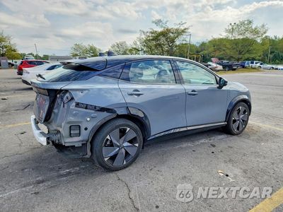 Trzecie zdjęcie samochodu z tyłu: 2023 NISSAN ARIYA PLATINUM + VIN:JN1DF0CD5PM702156 - miniatura
