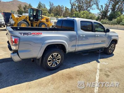 Trzecie zdjęcie samochodu z tyłu: 2021 TOYOTA TACOMA TRD SPORT VIN:3TMDZ5BN1MM100754 - miniatura