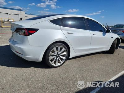 Trzecie zdjęcie samochodu z tyłu: 2018 TESLA MODEL 3 VIN:5YJ3E1EA3JF051601 - miniatura