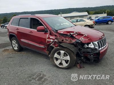Czwarte zdjęcie samochodu z boku: 2013 JEEP GRAND CHEROKEE LAREDO VIN:1C4RJFAG5DC502560 - miniatura