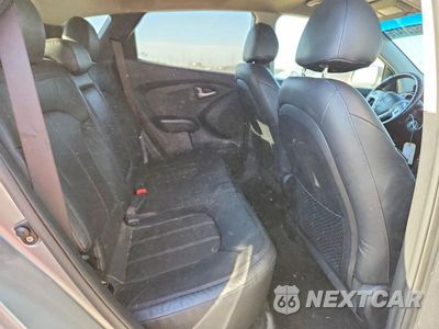 Zdjęcie 10 z 12 samochodu: 2012 HYUNDAI TUCSON LIMITED VIN:KM8JUCAC9CU382721 - miniatura