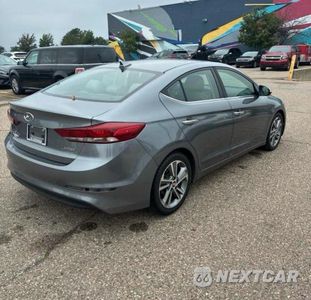Czwarte zdjęcie samochodu z boku: 2017 HYUNDAI ELANTRA LIMITED VIN:KMHD84LF4HU061935 - miniatura