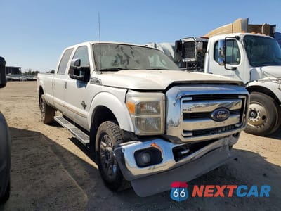 Czwarte zdjęcie samochodu z boku: 2014 FORD F350 SUPER DUTY VIN:1FT8W3BT4EEA67026 - miniatura